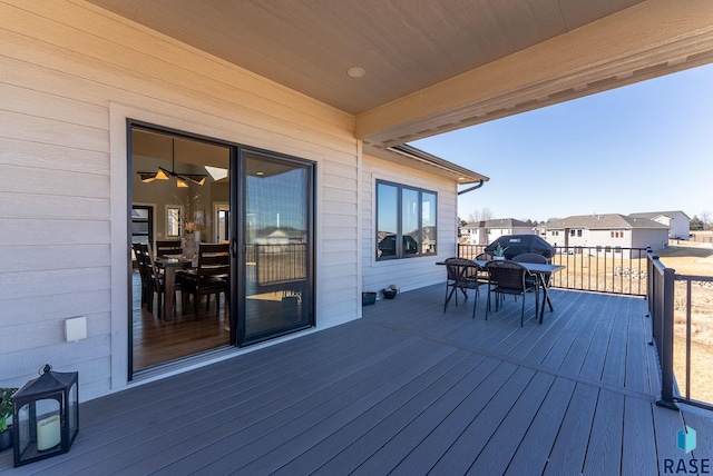 deck with outdoor dining space