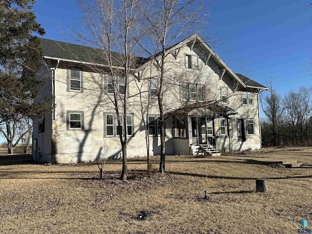 view of front of property with entry steps and stucco siding