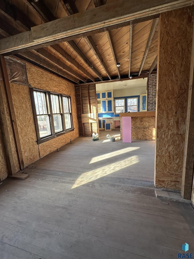 misc room featuring beam ceiling