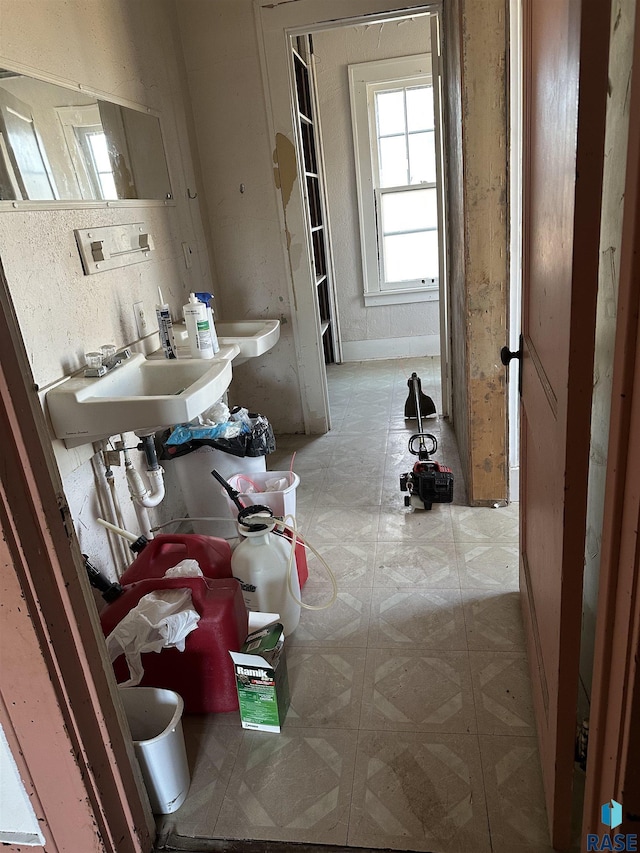 bathroom featuring a sink and tile patterned floors