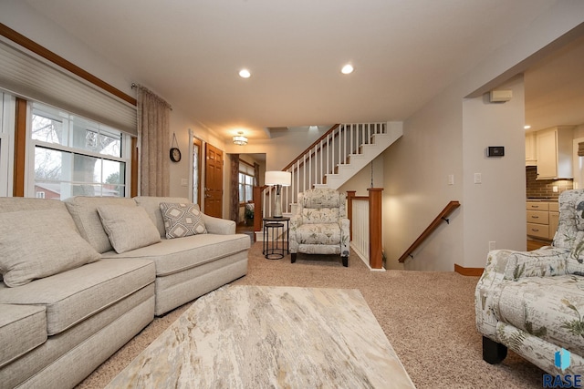 living room featuring carpet flooring and recessed lighting