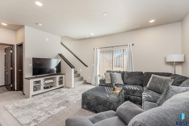 living room with stairs, carpet flooring, visible vents, and recessed lighting