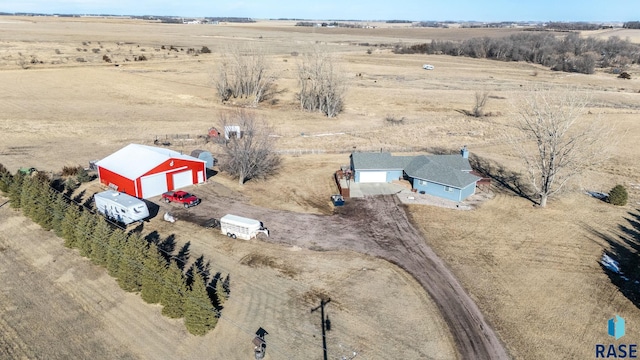 bird's eye view featuring view of desert and a rural view