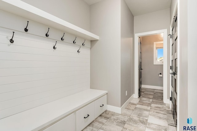 mudroom featuring baseboards