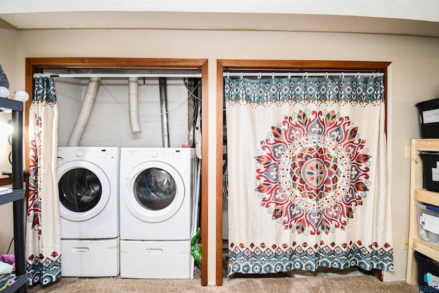 laundry room featuring laundry area, carpet flooring, and independent washer and dryer