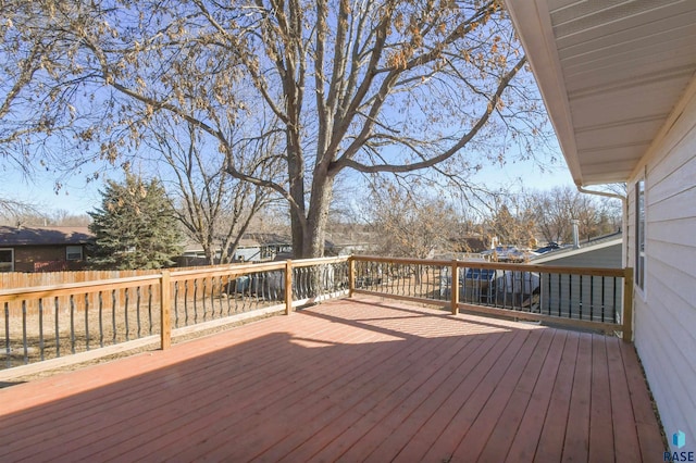 wooden deck featuring fence