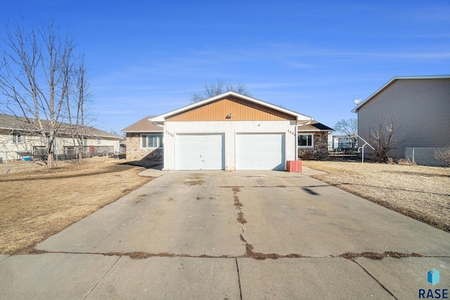 exterior space with a garage and driveway