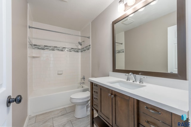 full bath with toilet, shower / washtub combination, vanity, and visible vents