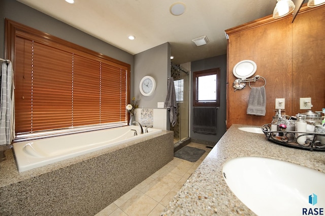 full bathroom with tile patterned floors, visible vents, a sink, a shower stall, and a bath