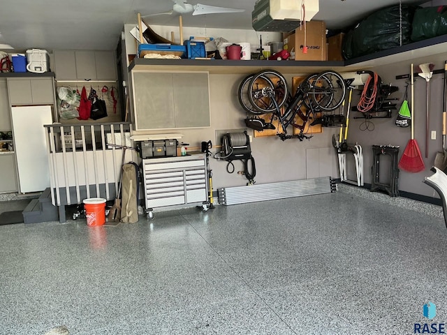 garage with freestanding refrigerator