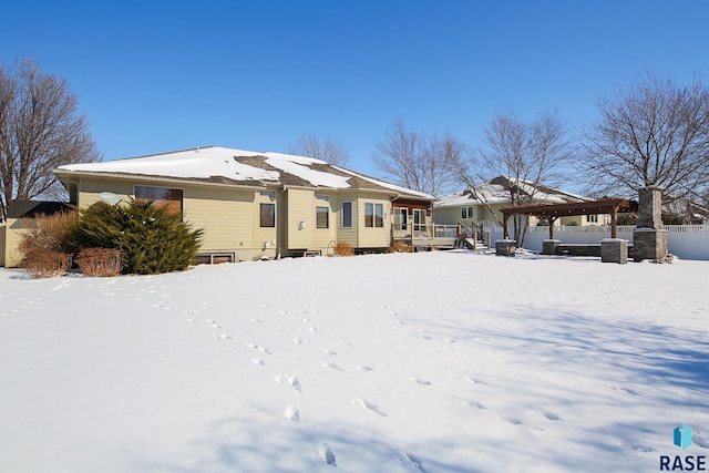 view of front of home with a deck and a pergola