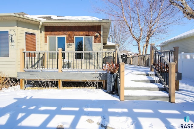 exterior space featuring stairway and a wooden deck