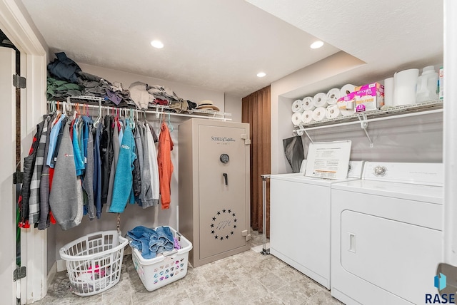 clothes washing area featuring laundry area, independent washer and dryer, and recessed lighting