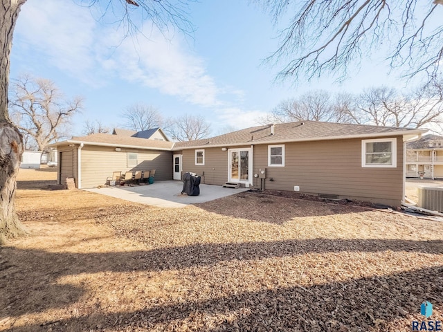 back of property featuring a patio and central air condition unit