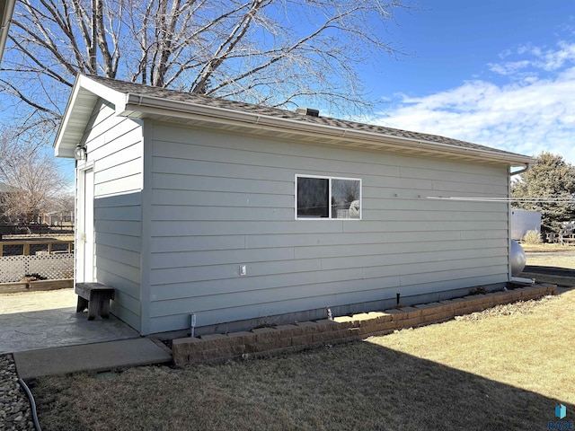 view of home's exterior with fence