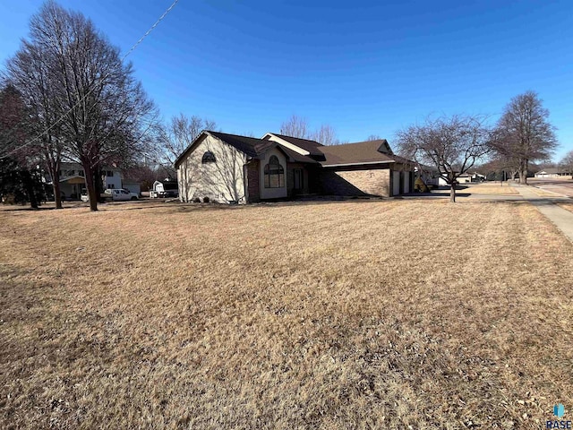 view of property exterior featuring a yard