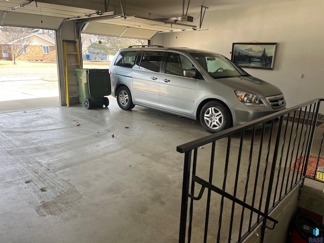 garage featuring a garage door opener