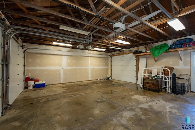 garage featuring a garage door opener