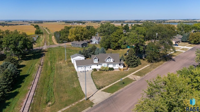 birds eye view of property featuring a rural view