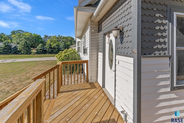 deck featuring a lawn