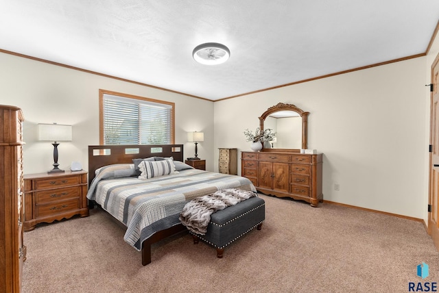 bedroom featuring baseboards, crown molding, and light colored carpet