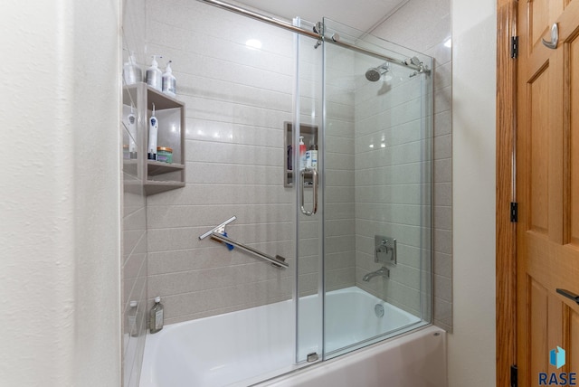 full bath with bath / shower combo with glass door