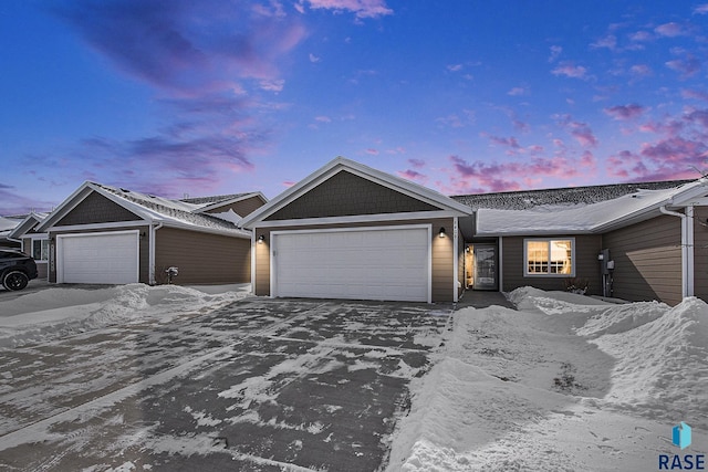 single story home featuring an attached garage