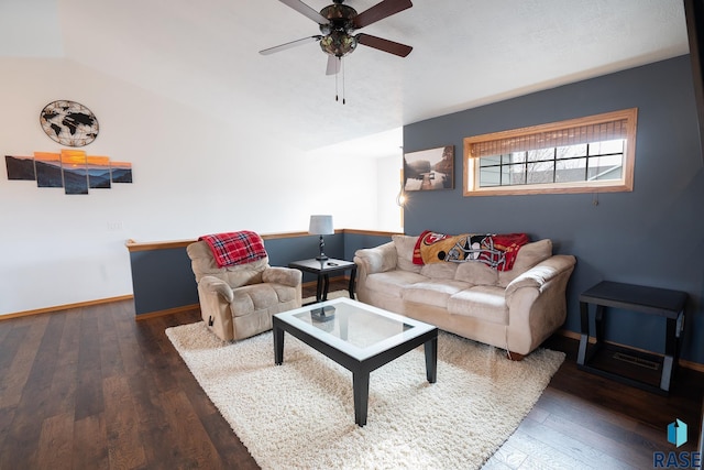 living room with hardwood / wood-style flooring, baseboards, vaulted ceiling, and a ceiling fan