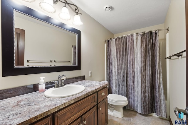 full bath featuring toilet, a shower with shower curtain, and vanity