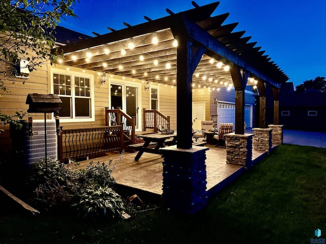 patio at night with a garage