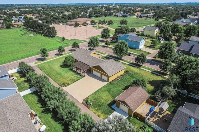 birds eye view of property with a residential view