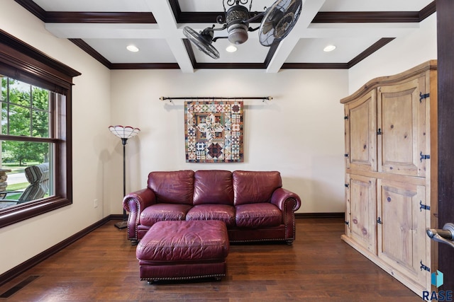 living room featuring baseboards, coffered ceiling, and wood finished floors