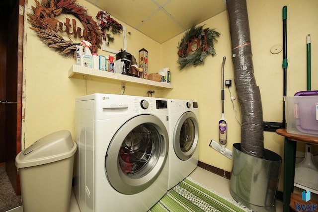 laundry room featuring laundry area and washing machine and clothes dryer