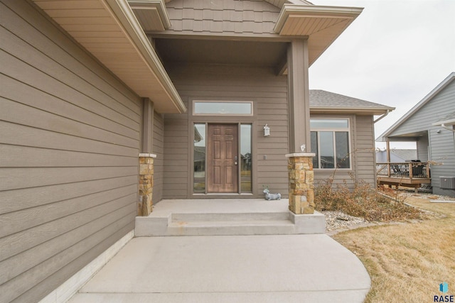 view of exterior entry with stone siding