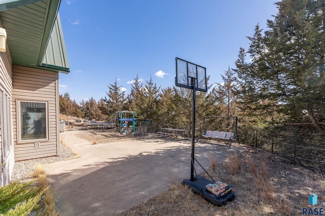 view of patio with a playground