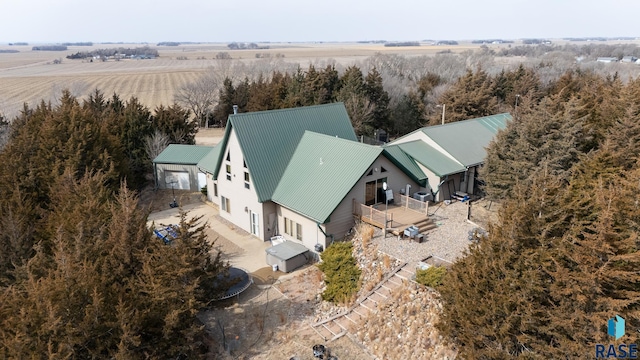 birds eye view of property featuring a rural view