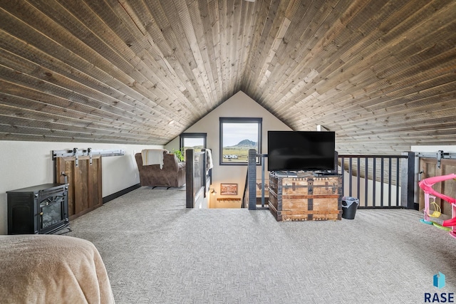 bedroom with lofted ceiling, wooden ceiling, and carpet floors