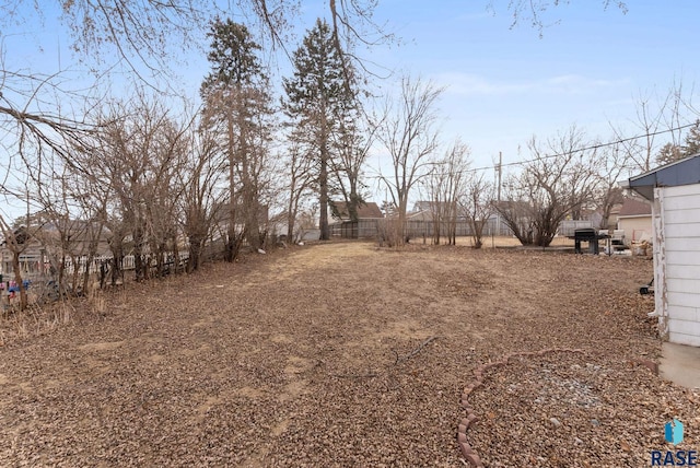 view of yard with fence