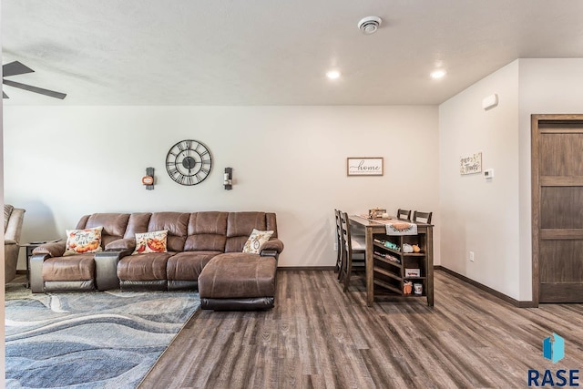 living room with recessed lighting, wood finished floors, a ceiling fan, and baseboards