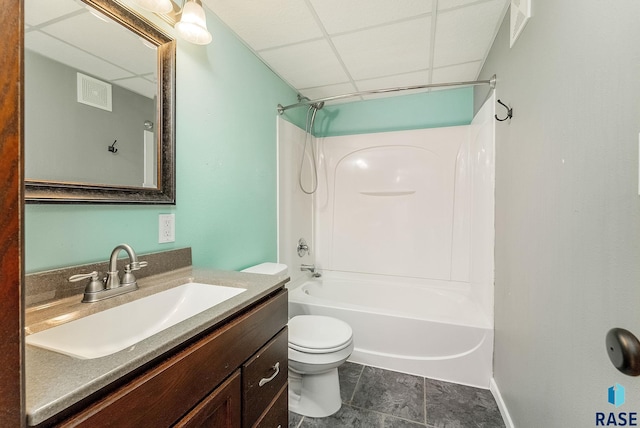 bathroom featuring shower / bathtub combination, toilet, a paneled ceiling, visible vents, and vanity