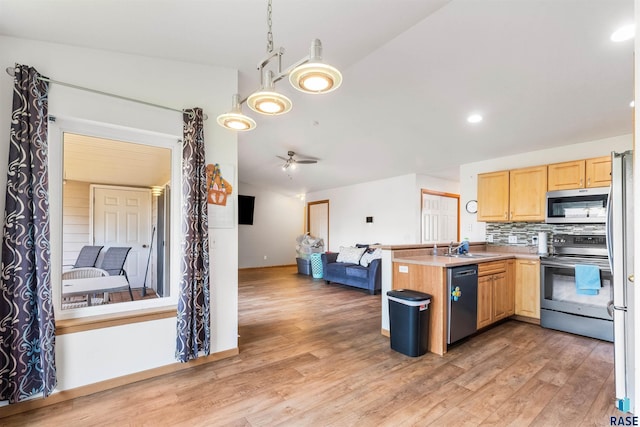 kitchen with tasteful backsplash, light brown cabinetry, appliances with stainless steel finishes, open floor plan, and a peninsula