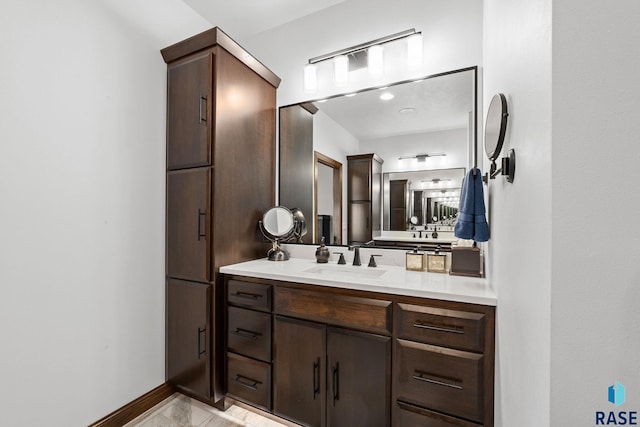 8501 E Torchwood Pl, Sioux Falls, SD 57110 - bathroom featuring vanity and baseboards