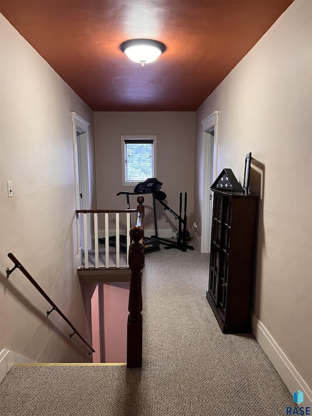 exercise room featuring baseboards