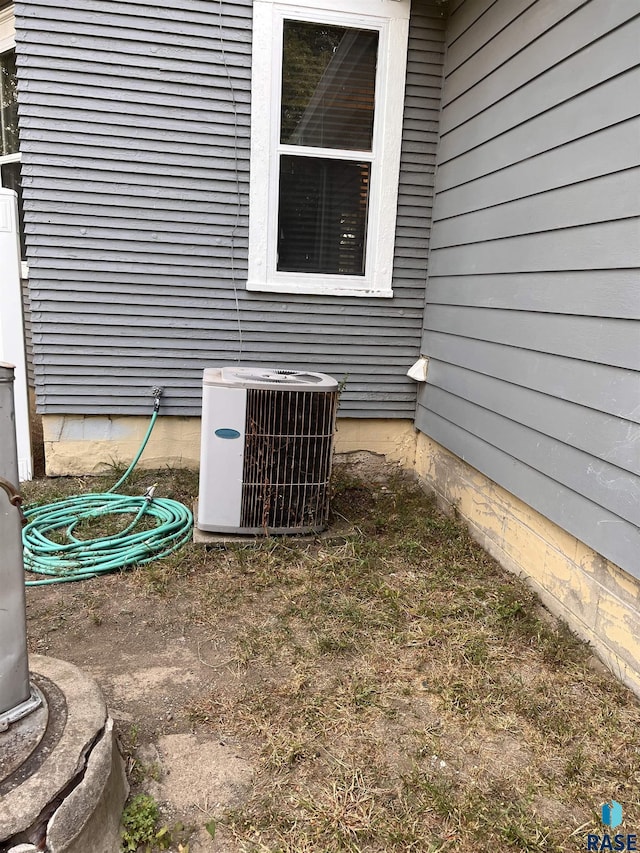 exterior details featuring central AC unit