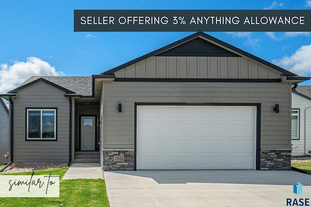 single story home with a garage, driveway, board and batten siding, and stone siding