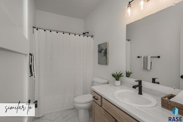 bathroom featuring marble finish floor, vanity, toilet, and a shower with curtain