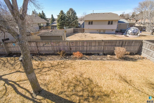 view of yard featuring a fenced backyard