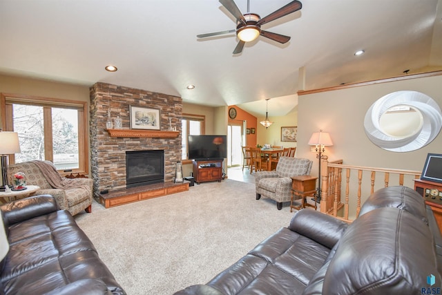 living area featuring carpet floors, recessed lighting, a fireplace, and vaulted ceiling