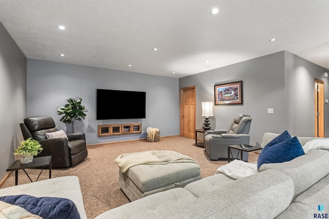 living area with baseboards, light colored carpet, and recessed lighting