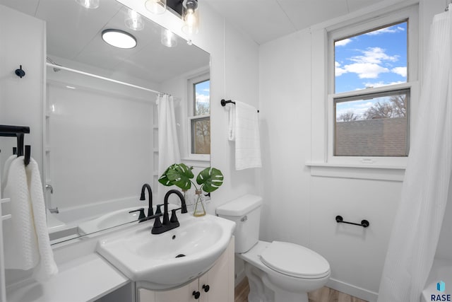 full bathroom with toilet, a shower with curtain, and vanity